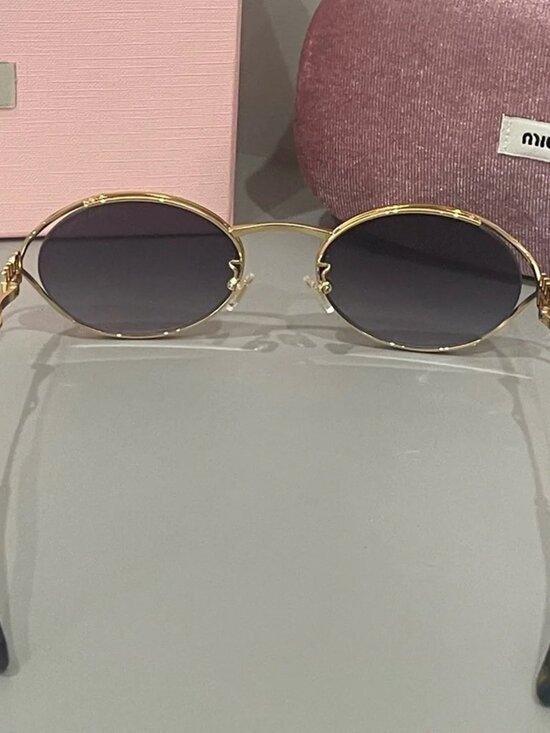 Miu Miu Oval Gold Frame Sunglasses